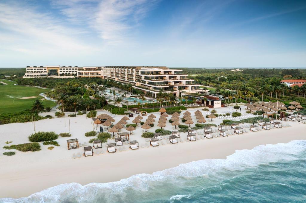 ATELIER Playa Mujeres luxury adults-only all-inclusive resort with beachfront infinity pools and modern Mexican architecture near Cancun.