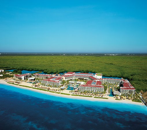 Breathless Riviera Cancun adults-only all-inclusive resort with lively pools and modern beachfront design in Riviera Maya.