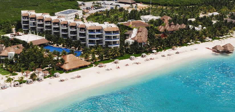 El Dorado Maroma adults-only luxury resort with beachfront pools and overwater bungalow accommodations in Riviera Maya.