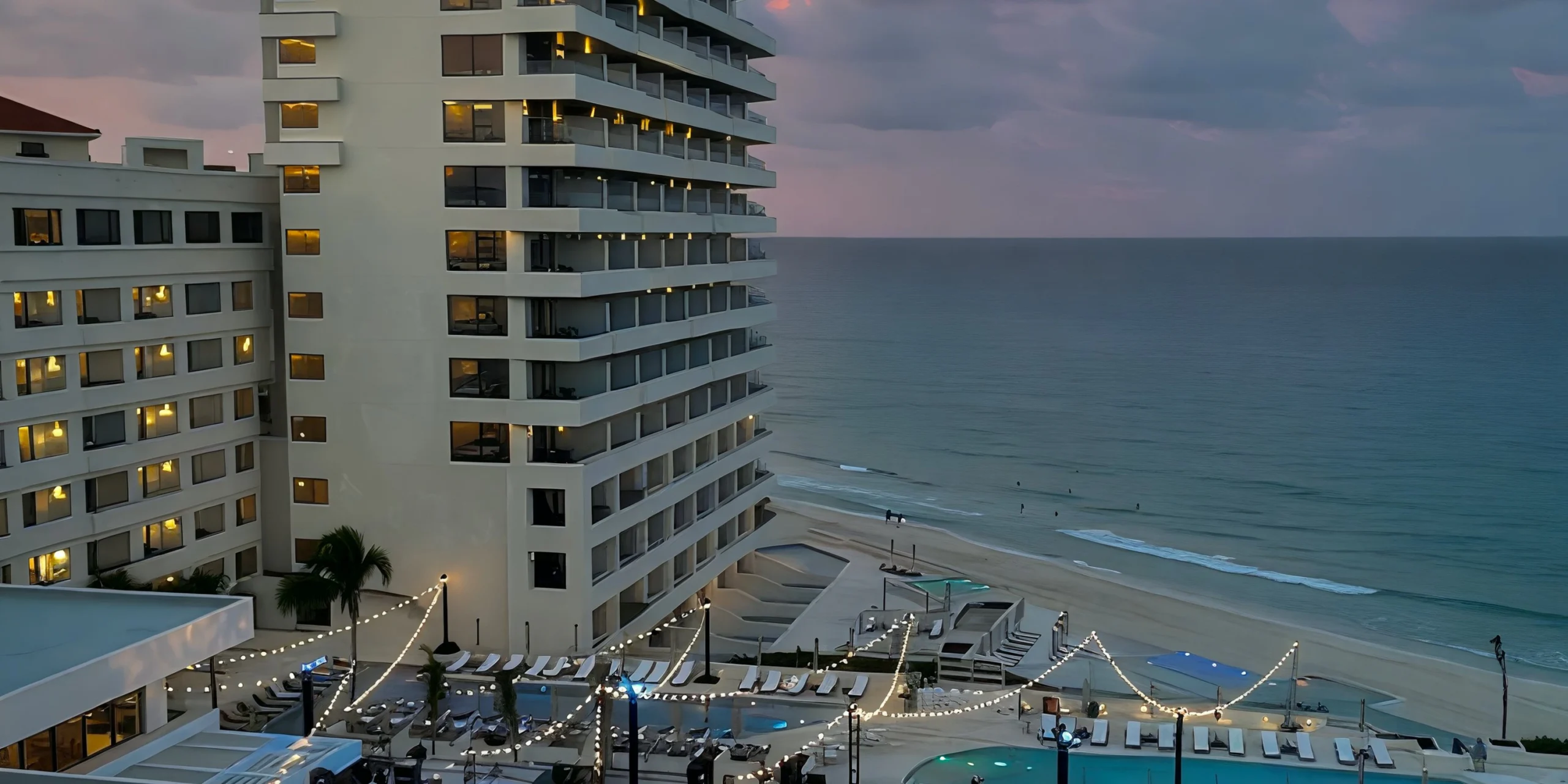 Main Pool Terrace wedding reception setup at Secrets Mirabel Cancun Resort & Spa
