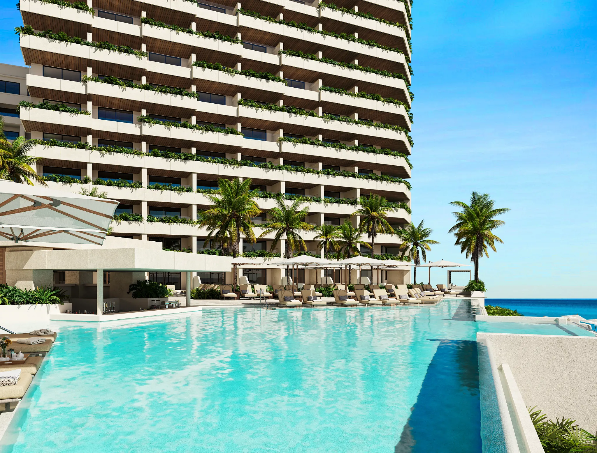 Infinity-edge pool deck with palm trees and ocean views at Secrets Mirabel Cancun Resort & Spa.