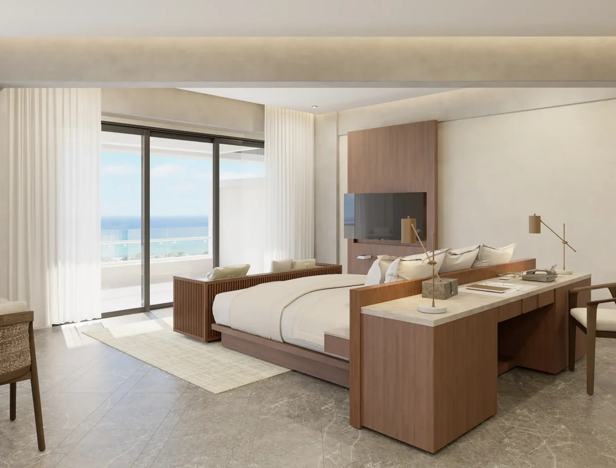 Preferred Club Master Suite Ocean Front bedroom with king bed, workspace, and private ocean-view terrace at Secrets Mirabel Cancun Resort & Spa.