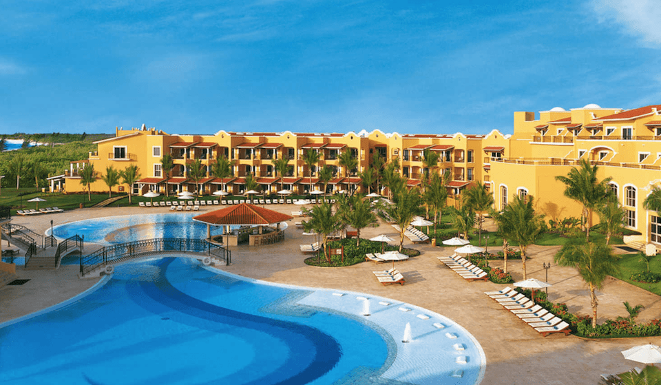 Secrets Capri Riviera Cancun adults-only all-inclusive resort with intimate beachfront setting and tropical gardens in Playa del Carmen.