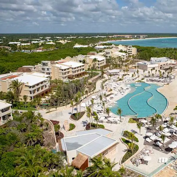 TRS Yucatan Hotel adults-only all-inclusive luxury resort in Riviera Maya with beachfront pools, swim-out suites, and upscale dining.