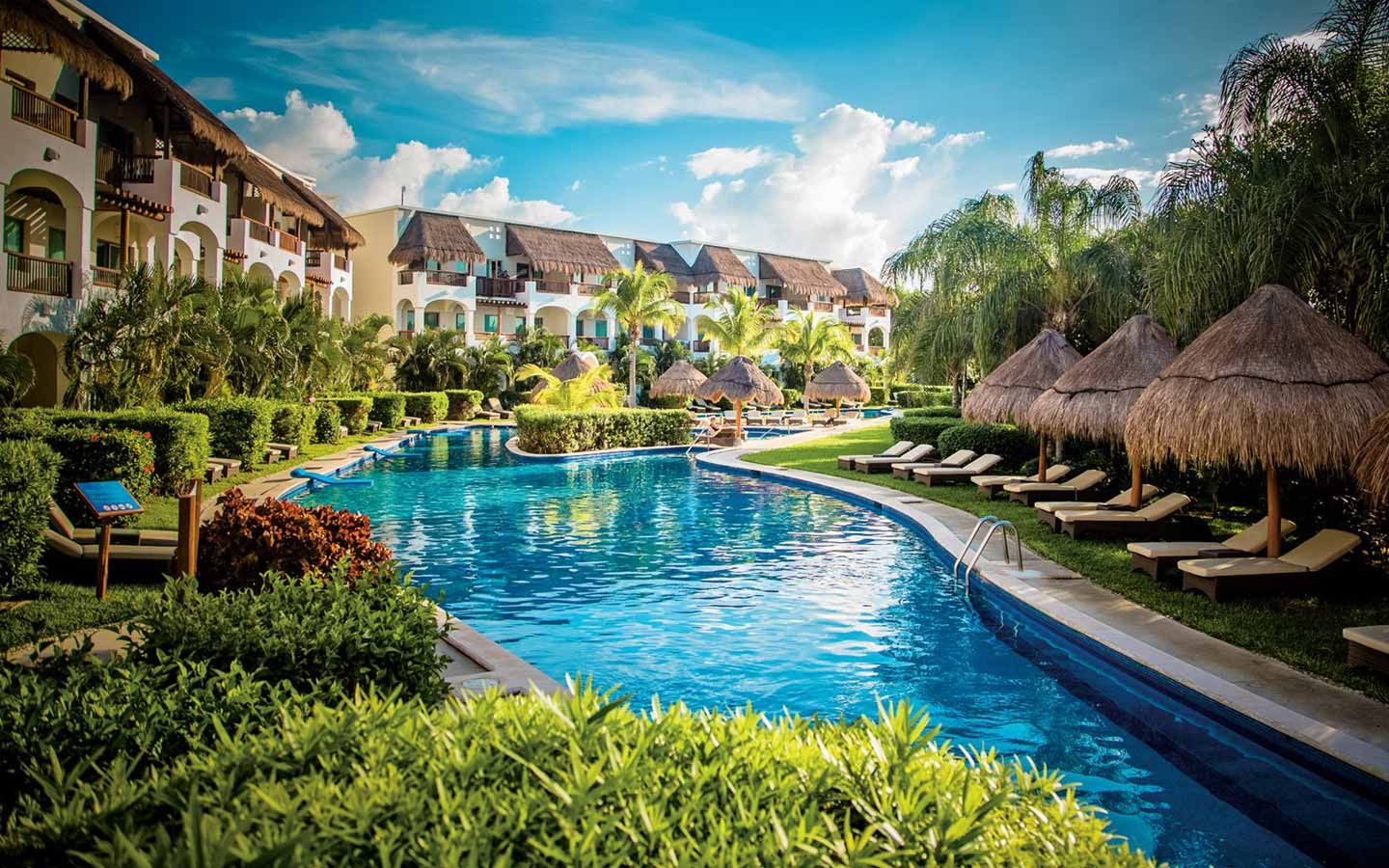 Valentin Imperial Riviera Maya adults-only all-inclusive resort with lagoon-style pools and tropical beachfront setting.